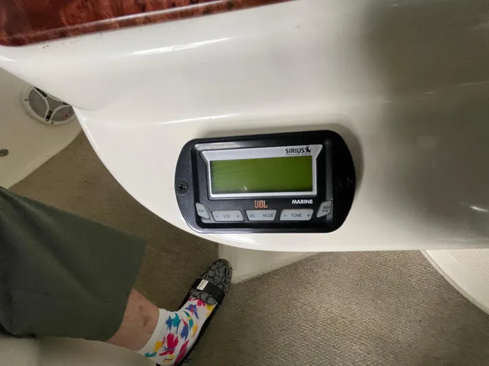 Seaduced Yacht Photos Pics JBL Marine radio on 2006 Meridian 341 Sedan boat interior.