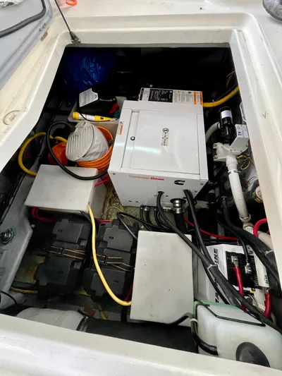 Seaduced Yacht Photos Pics Engine compartment of a 2006 Meridian 341 Sedan with visible wiring and components.