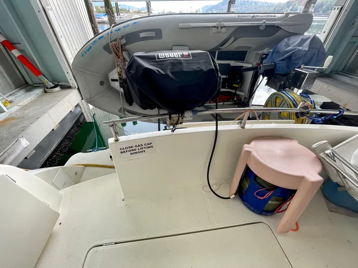 Seaduced Yacht Photos Pics 2006 Meridian 341 Sedan boat deck with equipment and storage items.