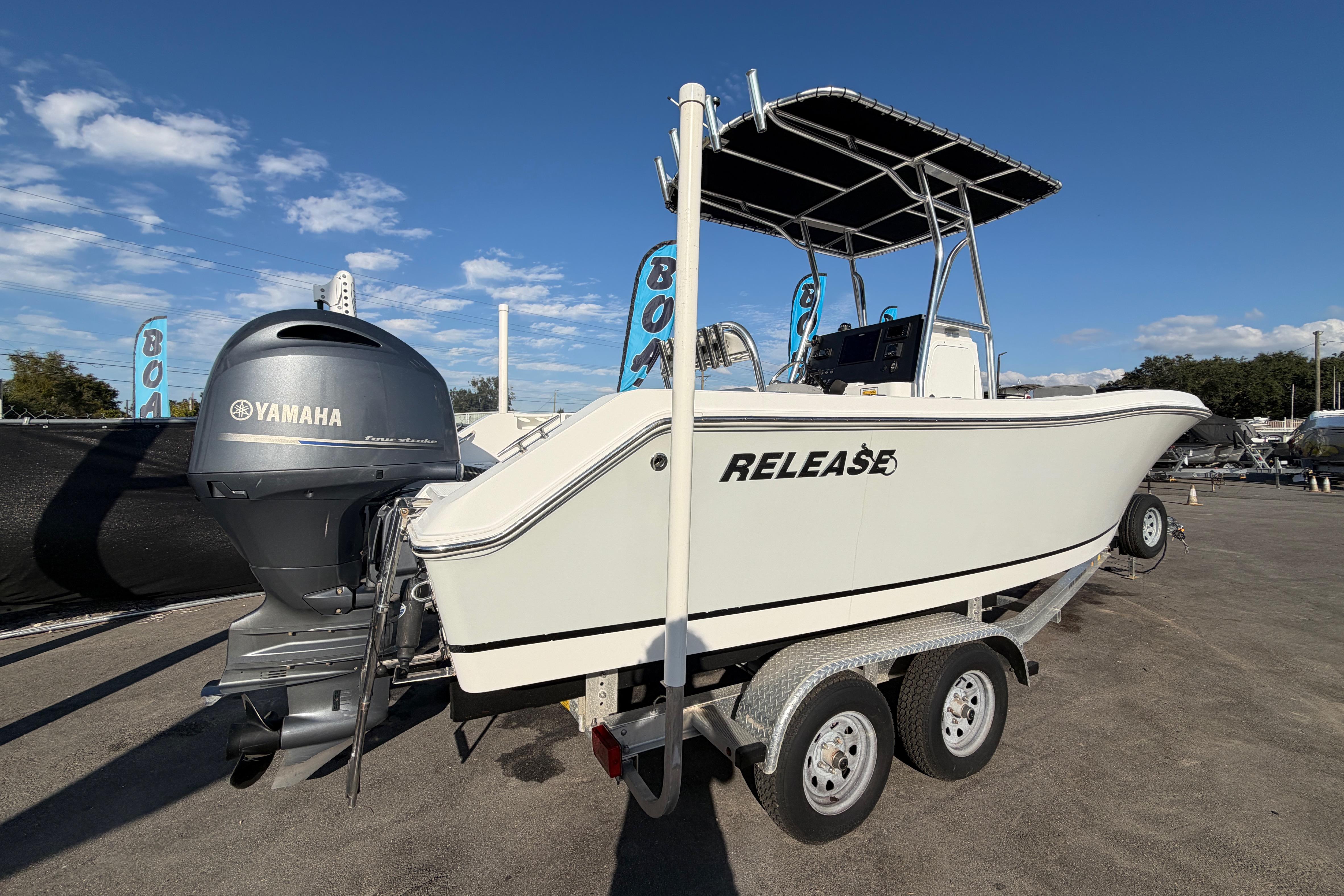 2019 Release 208RX boat with Yamaha engine on trailer under clear sky.
