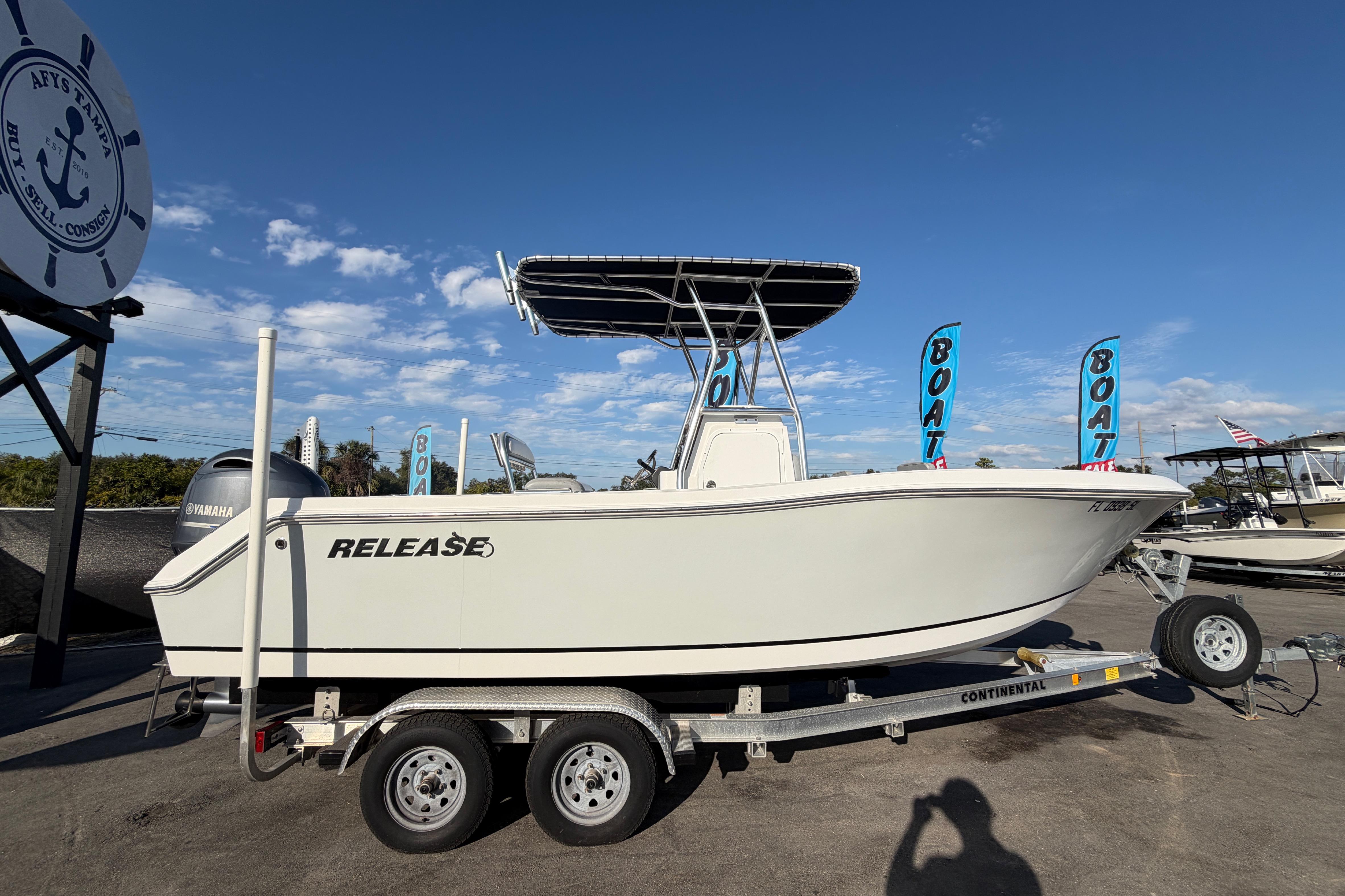 2019 Release 208RX boat on trailer, displayed outdoors under clear blue sky.
