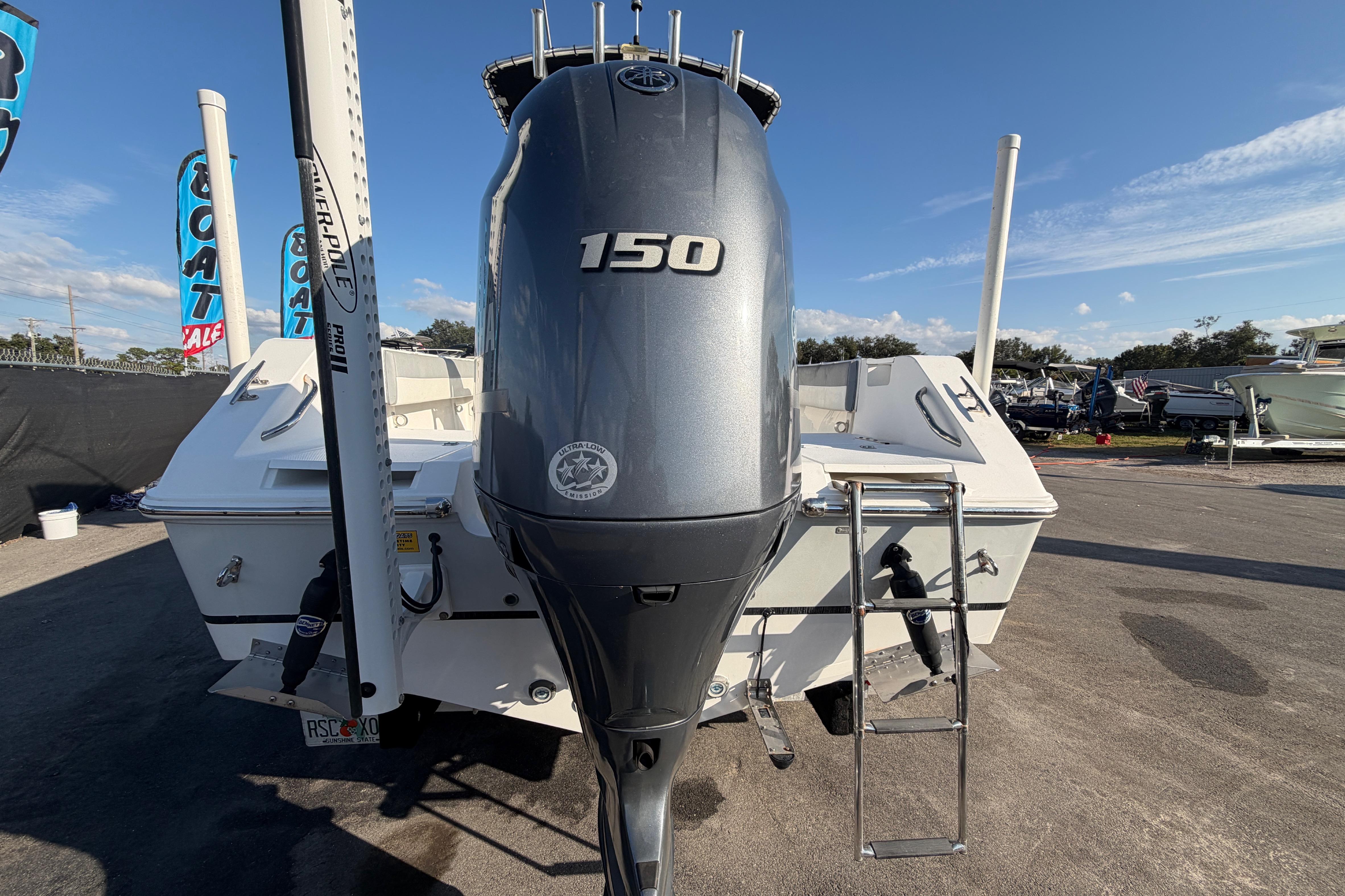 2019 Release 208RX boat with 150 horsepower engine at a sales lot.