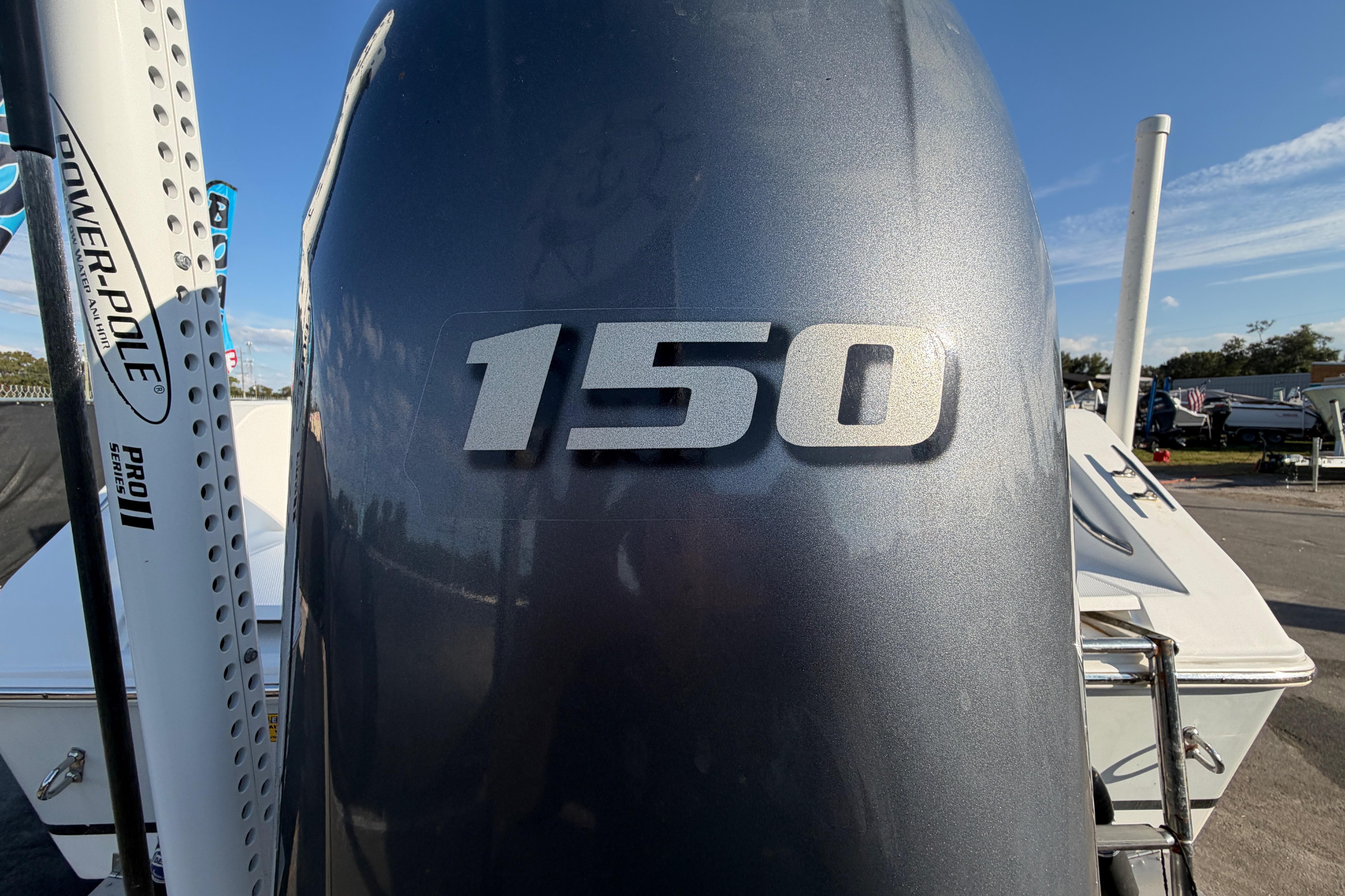 Outboard motor with "150" label on a 2019 Release 208RX boat, featuring Power-Pole Pro II.