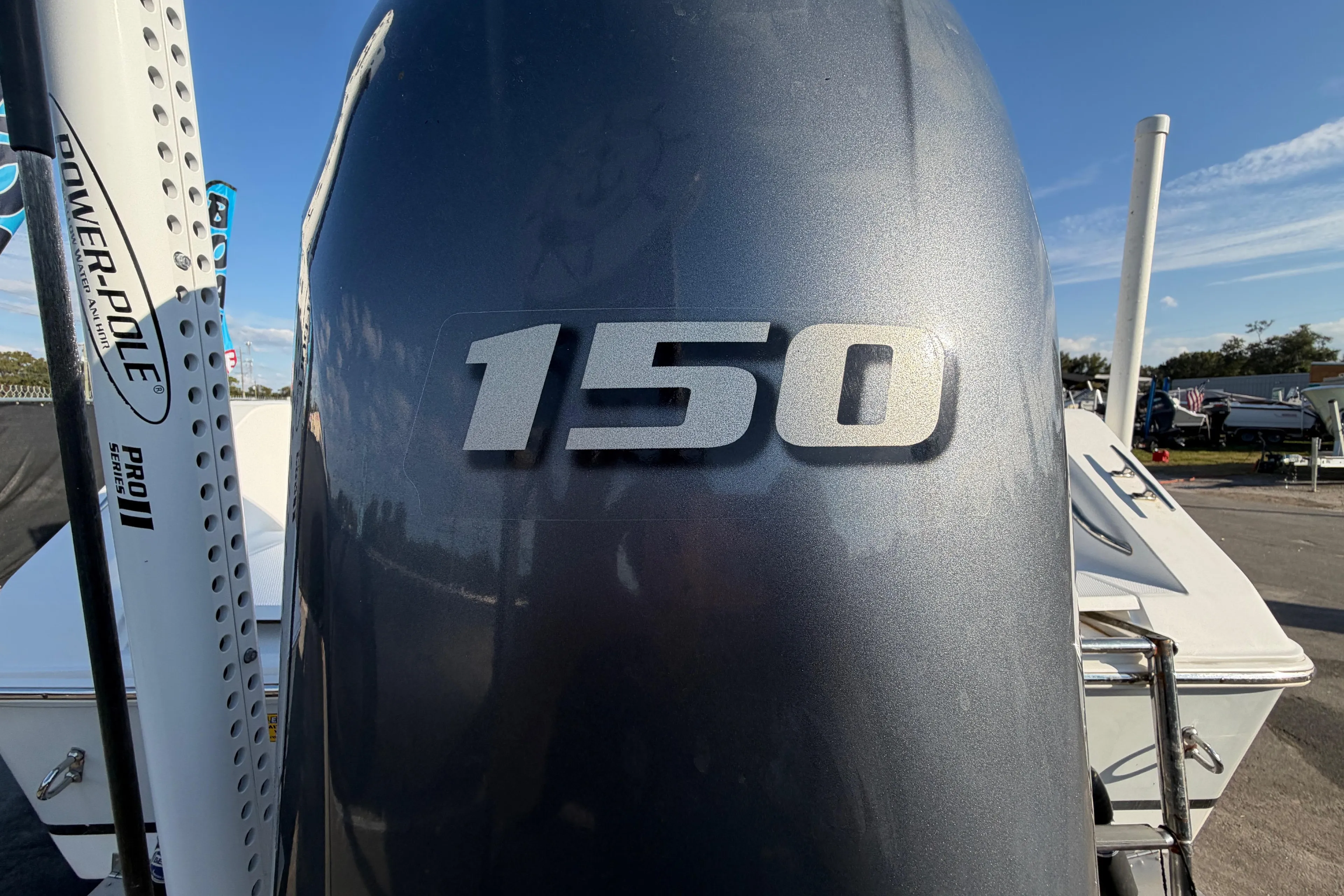 Outboard motor with "150" label on a 2019 Release 208RX boat, featuring Power-Pole Pro II.