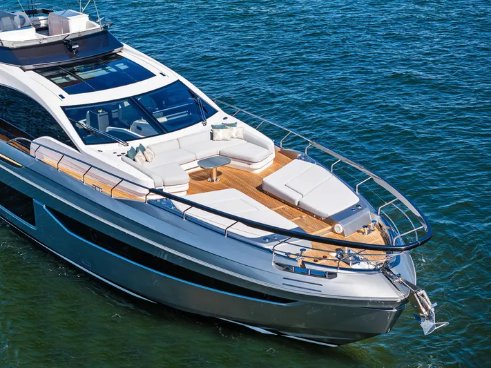 Yesenia Yacht Photos Pics 2024 Azimut S8 luxury yacht on blue water, showcasing sleek design and spacious deck.