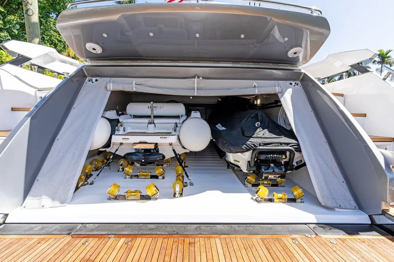 Yesenia Yacht Photos Pics 2024 Azimut S8 yacht garage with watercraft and equipment storage.
