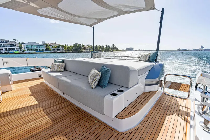 Yesenia Yacht Photos Pics Luxurious 2024 Azimut S8 yacht deck with elegant seating and ocean view.