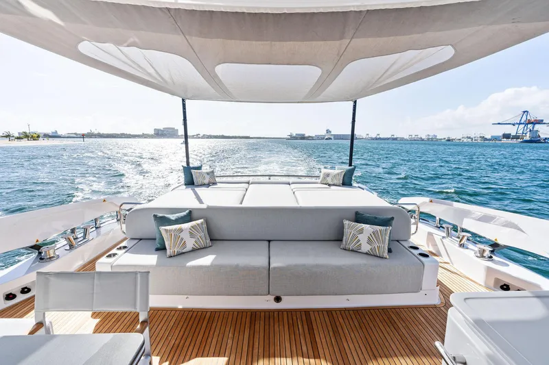 Yesenia Yacht Photos Pics Luxurious 2024 Azimut S8 yacht deck with elegant seating and ocean view.