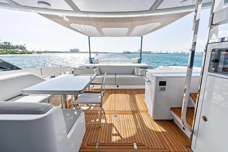 Yesenia Yacht Photos Pics Luxurious 2024 Azimut S8 yacht deck with elegant seating and ocean view.