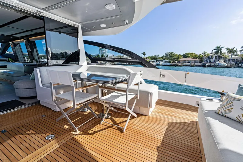 Yesenia Yacht Photos Pics Luxurious deck of 2024 Azimut S8 yacht with elegant seating and ocean view.