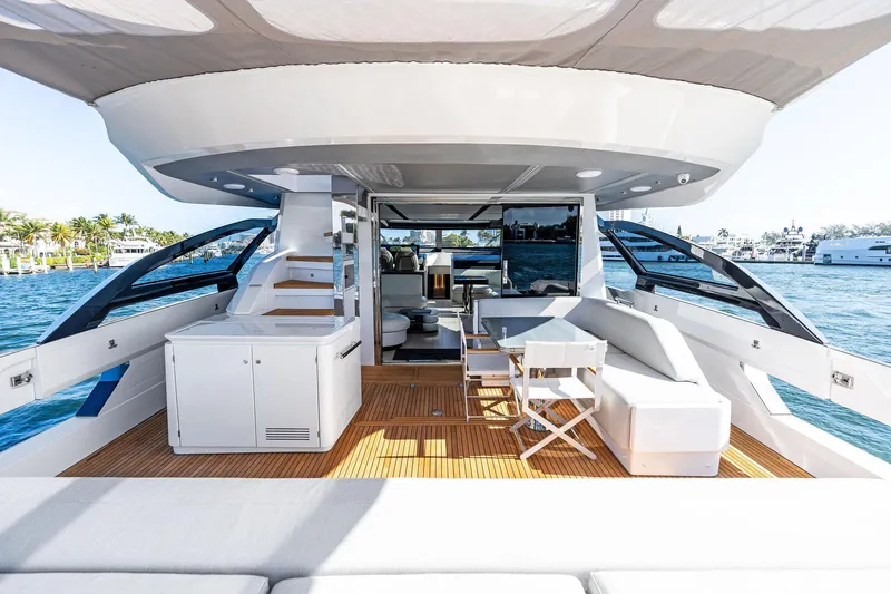 Yesenia Yacht Photos Pics Luxurious 2024 Azimut S8 yacht interior with modern seating and ocean view.