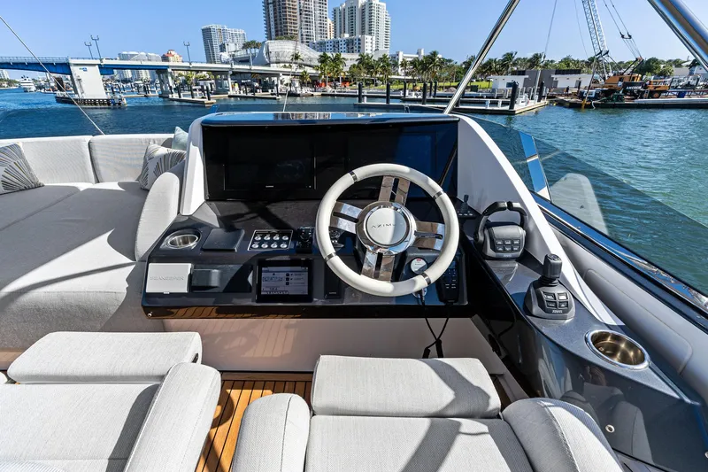 Yesenia Yacht Photos Pics 2024 Azimut S8 yacht helm with modern controls and waterfront view.