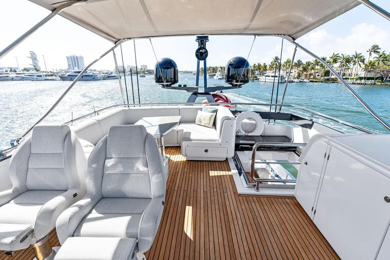 Yesenia Yacht Photos Pics 2024 Azimut S8 yacht deck with luxurious seating and ocean view.