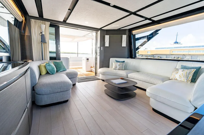 Yesenia Yacht Photos Pics Luxurious interior of 2024 Azimut S8 yacht with modern seating and elegant decor.
