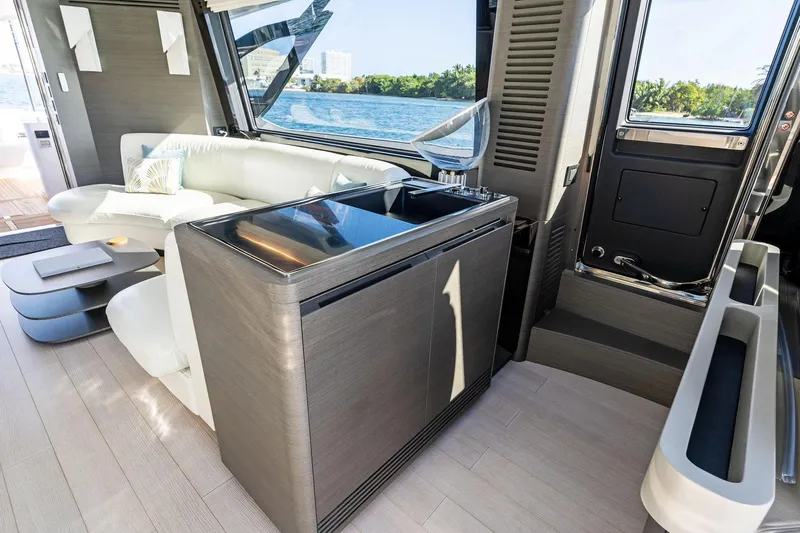 Yesenia Yacht Photos Pics Luxurious interior of 2024 Azimut S8 yacht with modern seating and sleek design.