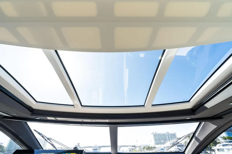 Yesenia Yacht Photos Pics 2024 Azimut S8 yacht interior with panoramic sunroof and modern design.