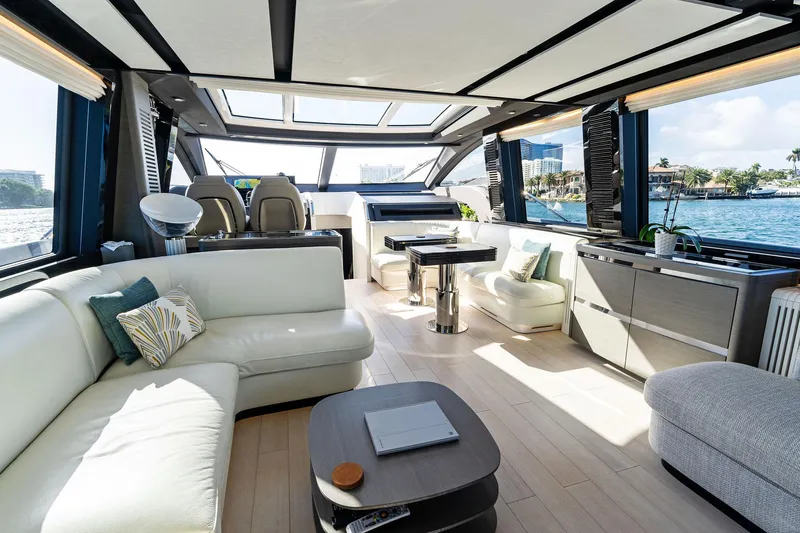 Yesenia Yacht Photos Pics Luxurious interior of 2024 Azimut S8 yacht with modern furnishings and panoramic windows.