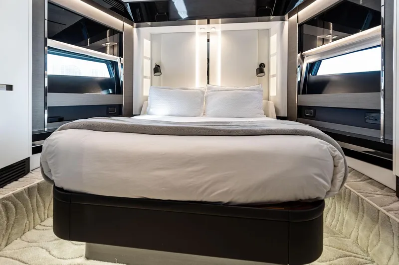 Yesenia Yacht Photos Pics Luxurious bedroom interior of 2024 Azimut S8 yacht with modern design and elegant lighting.