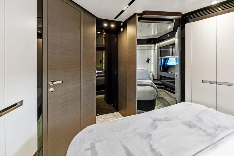 Yesenia Yacht Photos Pics Luxurious interior of 2024 Azimut S8 yacht, featuring modern bedroom design and elegant furnishings.