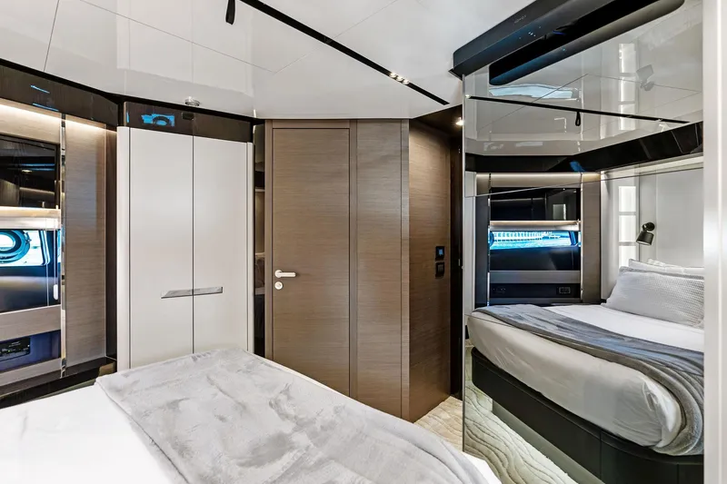 Yesenia Yacht Photos Pics Luxurious interior of 2024 Azimut S8 yacht, featuring modern design and comfortable sleeping quarters.