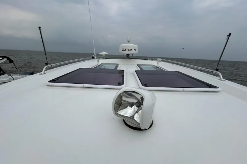  Yacht Photos Pics 2024 Beneteau Antares 11 boat deck with Garmin equipment, ocean view.