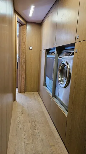 Little Giant Yacht Photos Pics Sunreef 88 DD 2017 yacht interior with laundry appliances.