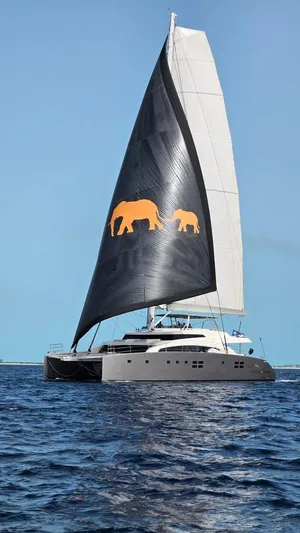 Little Giant Yacht Photos Pics Luxury Sunreef 88 DD catamaran sailing on open sea, 2017 model.