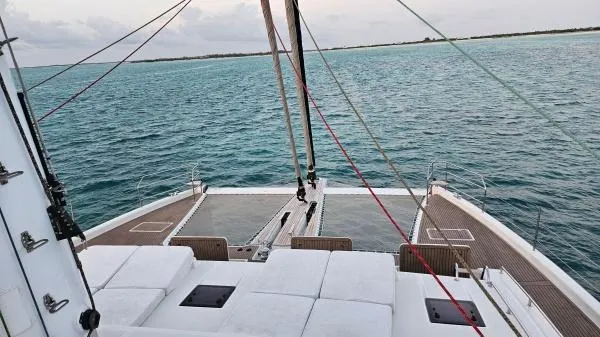 Little Giant Yacht Photos Pics Luxurious Sunreef 88 DD yacht deck overlooking serene ocean waters, 2017 model.