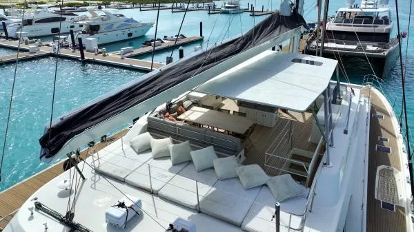 Little Giant Yacht Photos Pics Luxurious Sunreef 88 DD yacht, 2017 model, docked at marina with spacious deck and seating.