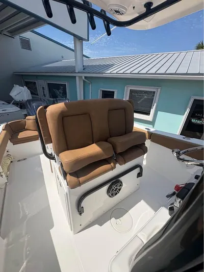  Yacht Photos Pics 2022 SeaHunter 275 ULTRA boat with brown seating and modern design.
