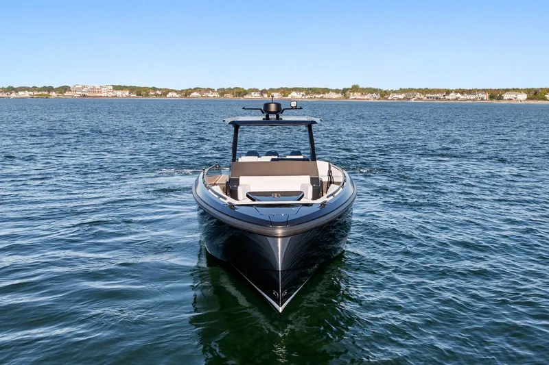  Yacht Photos Pics 2024 Vanquish Yachts 40 on open water, showcasing sleek design and luxury features.