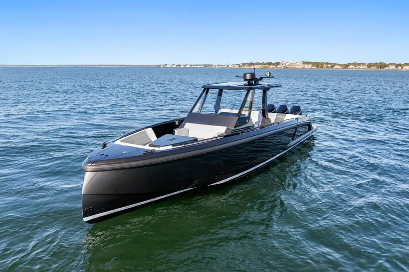  Yacht Photos Pics 2024 Vanquish Yachts 40 on open water, sleek design, modern luxury boat.