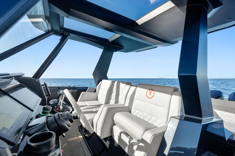  Yacht Photos Pics Interior of 2024 Vanquish Yachts 40, featuring luxurious seating and modern design.