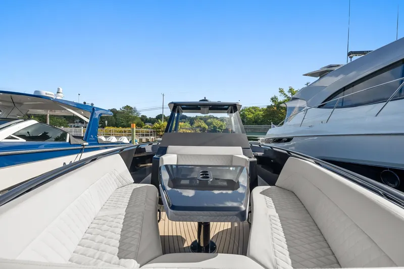  Yacht Photos Pics 2024 Vanquish Yachts 40 interior with luxurious seating and sleek design.