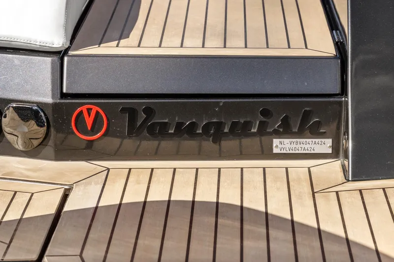  Yacht Photos Pics 2024 Vanquish Yachts 40, logo and details on teak deck.