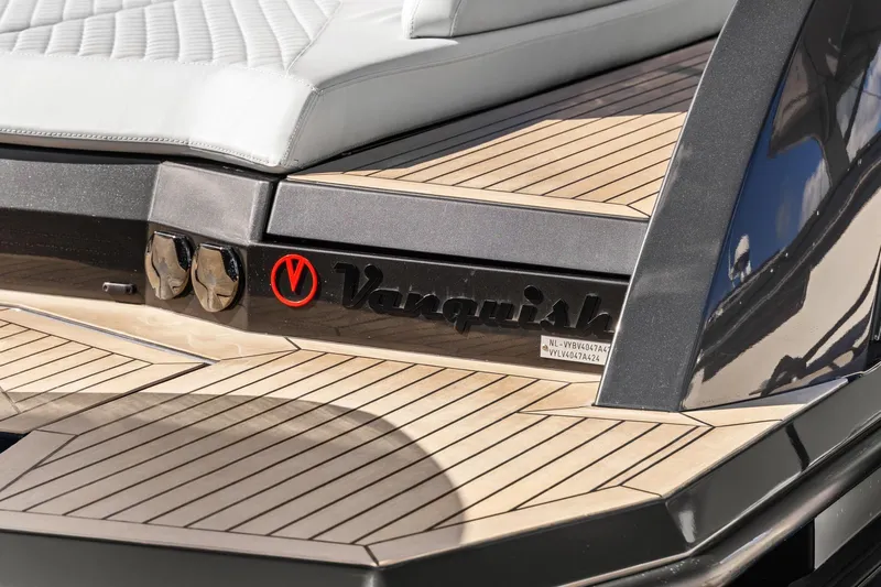  Yacht Photos Pics 2024 Vanquish Yachts 40, luxury yacht with sleek design and elegant wood decking.