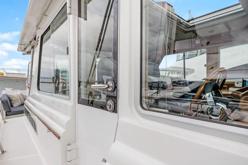 Second Rodeo Yacht Photos Pics 2018 Sabre 48 Salon Express yacht, showcasing sleek exterior and luxurious interior details.