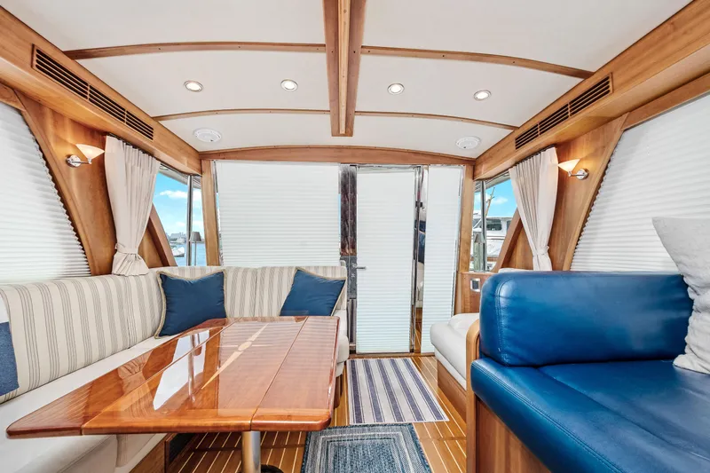 Second Rodeo Yacht Photos Pics Interior of 2018 Sabre 48 Salon Express yacht with elegant seating and wooden accents.