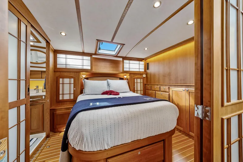 Second Rodeo Yacht Photos Pics Luxurious cabin interior of 2018 Sabre 48 Salon Express yacht with wood finish.