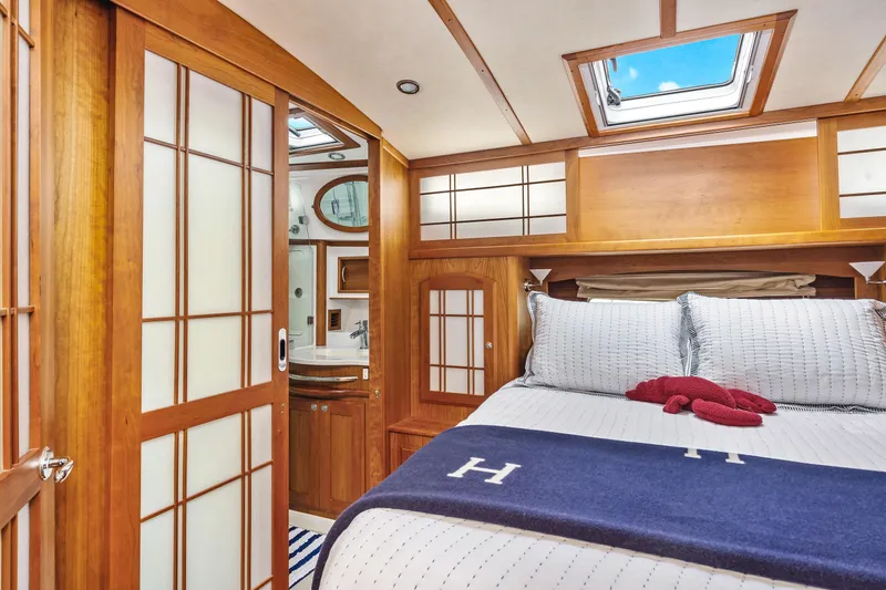 Second Rodeo Yacht Photos Pics Luxurious 2018 Sabre 48 Salon Express cabin with elegant wood finishes and skylight.