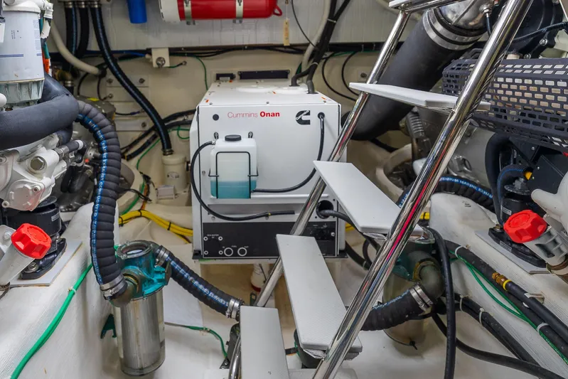 Second Rodeo Yacht Photos Pics Engine room of 2018 Sabre 48 Salon Express with Cummins Onan generator.