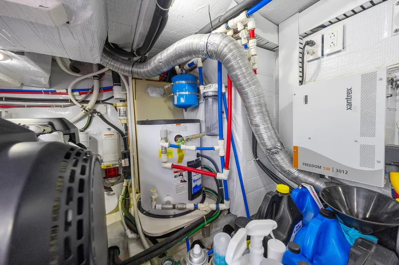 Second Rodeo Yacht Photos Pics Engine room of 2018 Sabre 48 Salon Express with mechanical systems and equipment.