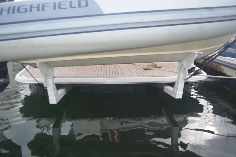 Second Rodeo Yacht Photos Pics 2018 Sabre 48 Salon Express yacht with a Highfield tender on hydraulic platform.