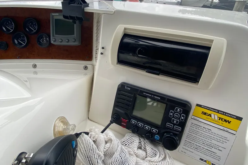 Carousel Yacht Photos Pics 2007 Silverton 36 Convertible boat dashboard with gauges, radio, and Sea Tow information.