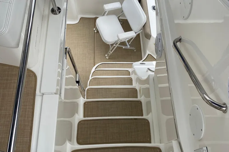 Carousel Yacht Photos Pics Staircase and seating area on a 2007 Silverton 36 Convertible yacht.