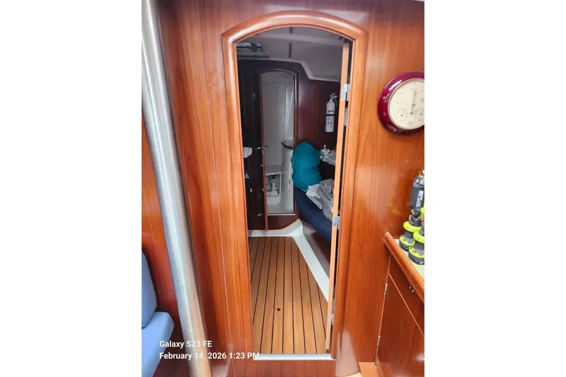 Little Su Yacht Photos Pics Interior view of 2005 Beneteau Oceanis Clipper 393 sailboat with wooden finish.