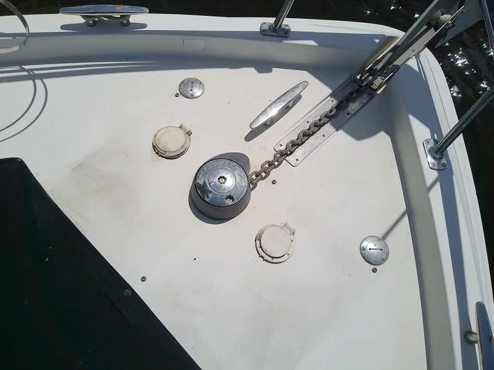 Cash Flow Yacht Photos Pics Deck of 2005 Carver 36 Mariner with anchor chain and fittings.