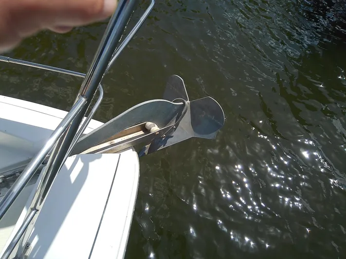 Cash Flow Yacht Photos Pics Anchor of 2005 Carver 36 Mariner boat over water.