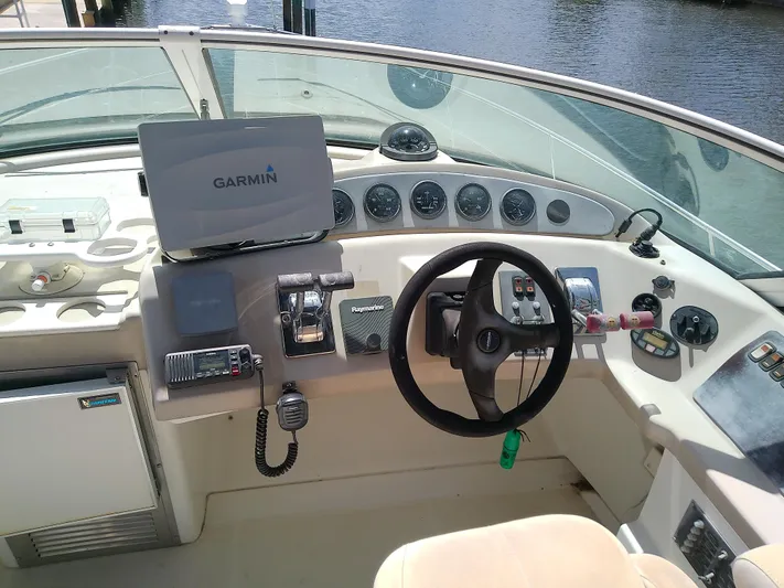Cash Flow Yacht Photos Pics 2005 Carver 36 Mariner helm with Garmin navigation system and control panel.