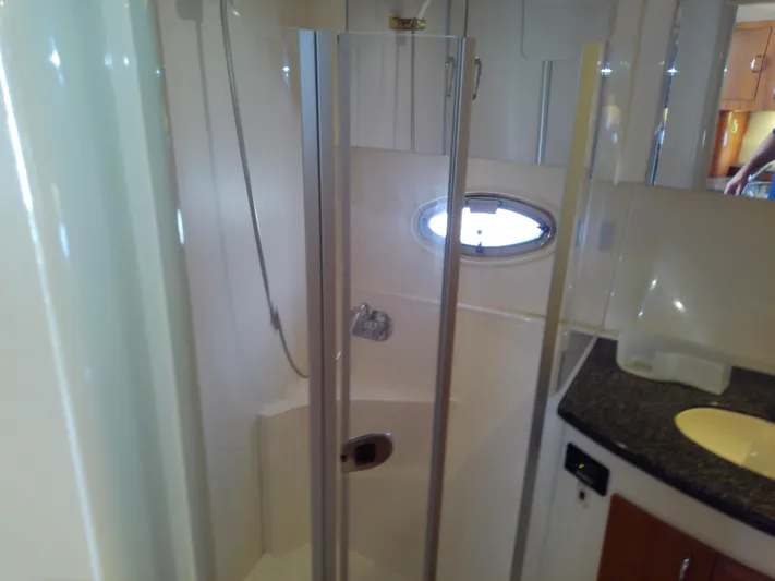 Cash Flow Yacht Photos Pics Bathroom interior of 2005 Carver 36 Mariner yacht with shower and sink.
